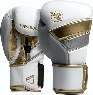 Guantes de Boxeo Hayabusa T3 de Cuero Blancos y Dorados Guantes de boxeo Hayabusa T3 de cuero de color blanco y dorado sobre un fondo blanco.